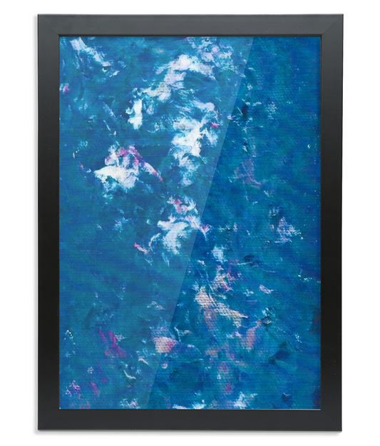 Framed abstract artwork featuring textured shades of blue with hints of white and pink, resembling ocean waves or a cloudy sky.

