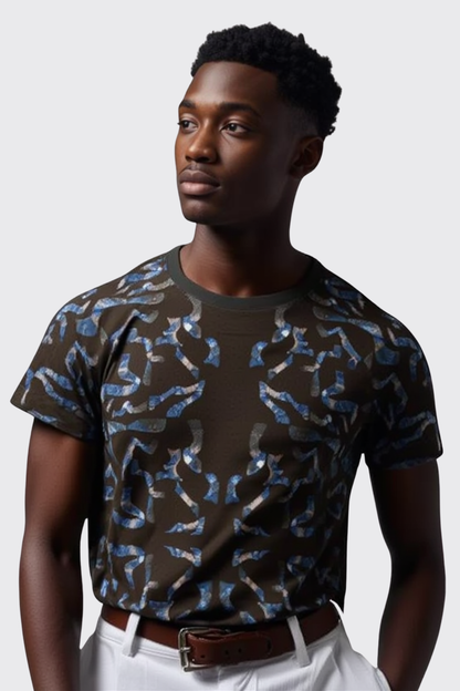 A man wearing a brown patterned t-shirt