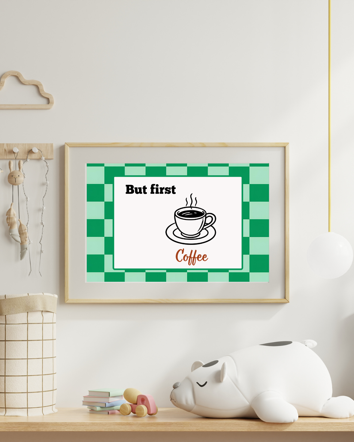 “But First Coffee” printable in wooden frame hanging in a home entryway