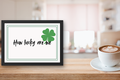 Minimalist kitchen wall art featuring green four leaf clover illustration