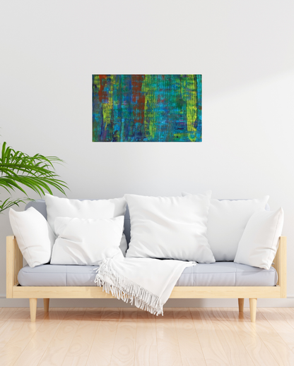Abstract canvas artwork featuring a mix of vibrant colors, including blue, green, yellow, and red, with vertical textured patterns, set against a white background in a modern living room with futon sofa bed.
